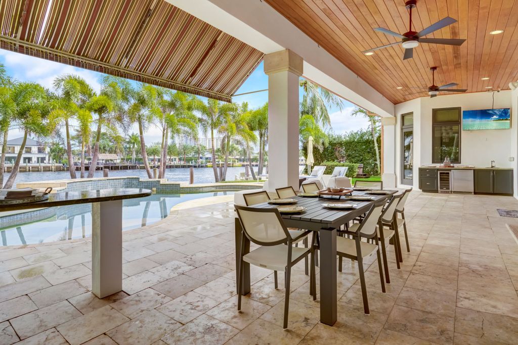 Covered terrace and summer kitchen, open to the pool and Intracoastal