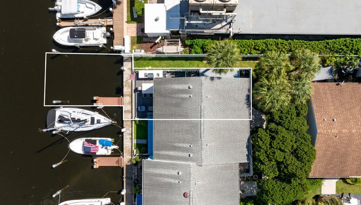 Aerial view of the residence and its boat slip